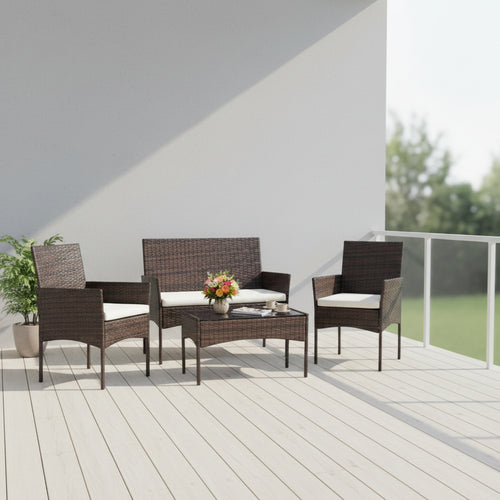 Outdoor furniture set with wicker chairs and a table on a minimalistic porch  background