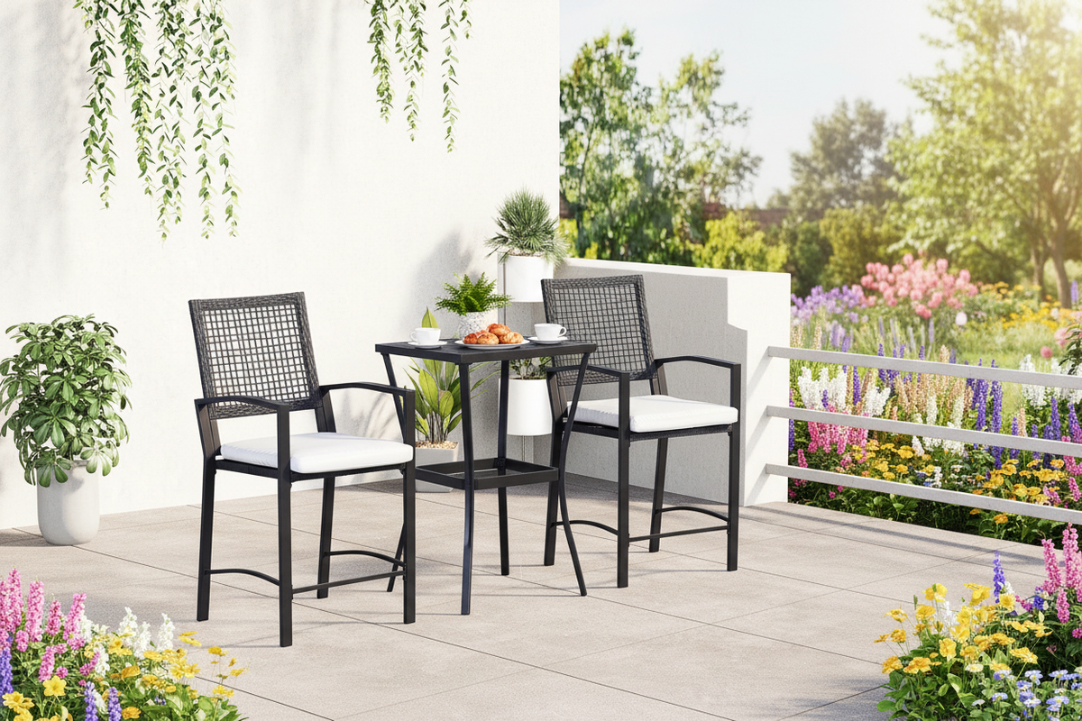 3-piece black wicker bar set with cream cushioned barstools and slat table on a garden deck in the morning
